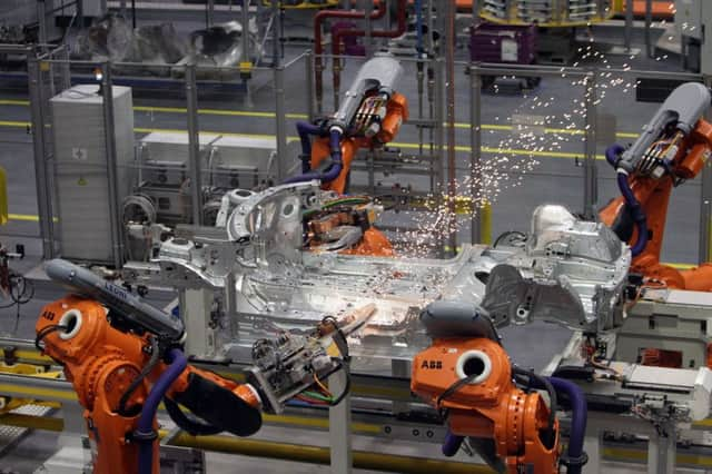 Library image of a production line  Photo: Steve Parsons/PA Wire