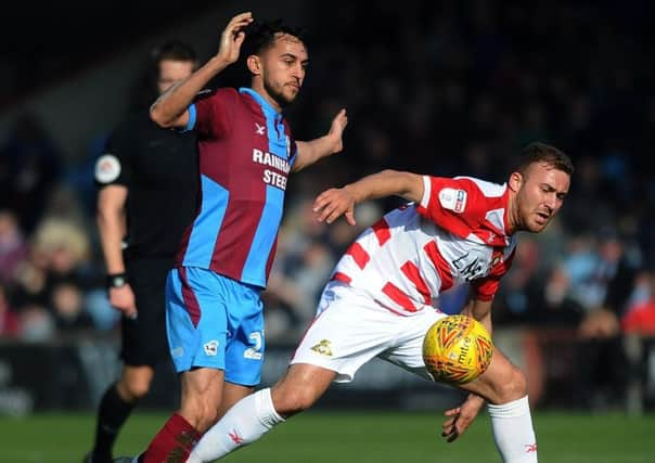 Doncaster's Herbie Kane playing against Scunthorpe last season has reunited with Grant McCann at Hull.
(Picture: Jonathan Gawthorpe)