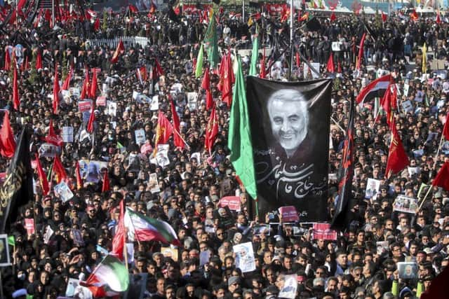 Mourners attend a funeral ceremony for Iranian Gen. Qassem Soleimani and his comrades, who were killed in Iraq in a U.S. drone strike on Friday.