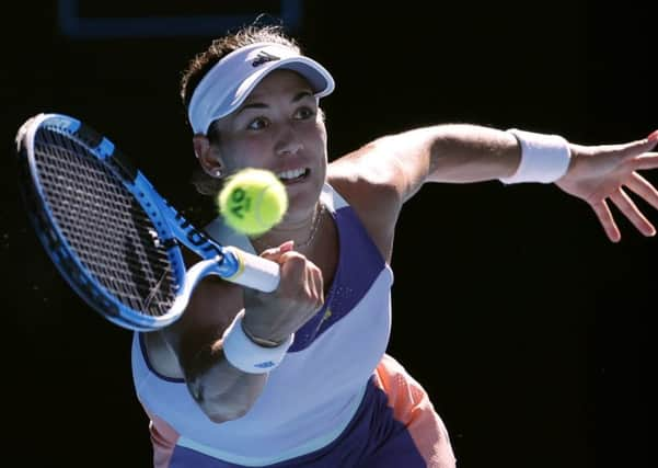 Spains Garbine Muguruza plays a shot during her Australian semi-final win over Simona Halep. (Picture: Dita Alangkara/AP)