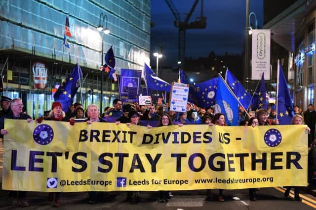 Anti-Brexit protesters during a rally in Leeds city centre