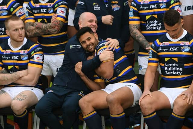 LOOKING AHEAD: Leeds Rhinos' Rhyse Martin gets a hug from coach Richard Agar during the team's photo call earlier this year.