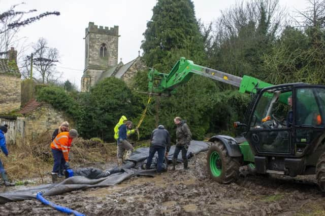 Kirkby Wharfe residents erected the Aquadam themselves