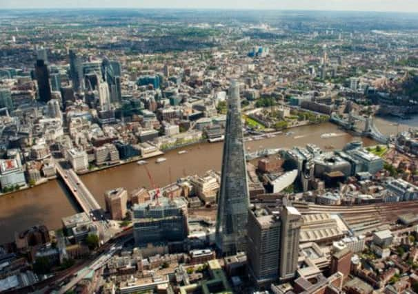 The view of the Shard  building (foreground) at London Bridge, London.