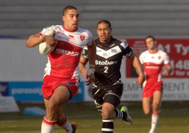 Hull KR's Omari Caro gets way from Widnes Vikings' Willie Isa to score