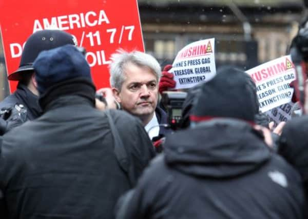 Chris Huhne and Vicky Pryce arrive at court today