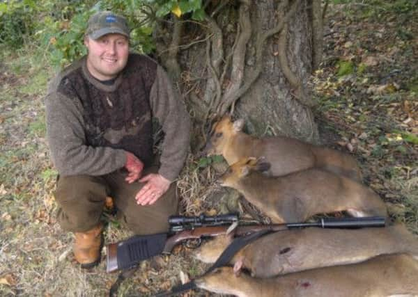 John Robson shows off some of the fruits of his labour