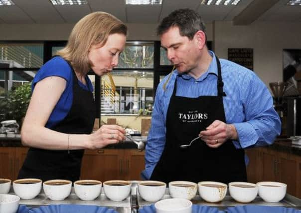 Hannah Eatough, coffee buyer, and Rick Tingley, coffee buying manager, in the tasting room.
 Picture by Gerard Binks