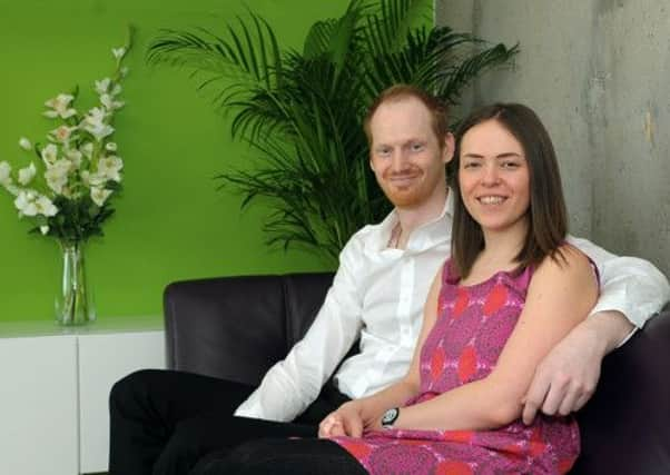 James and Emma Lees at home in their flat