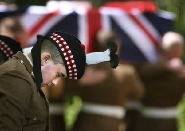 Soldiers at the funeral of Corporal William Savage