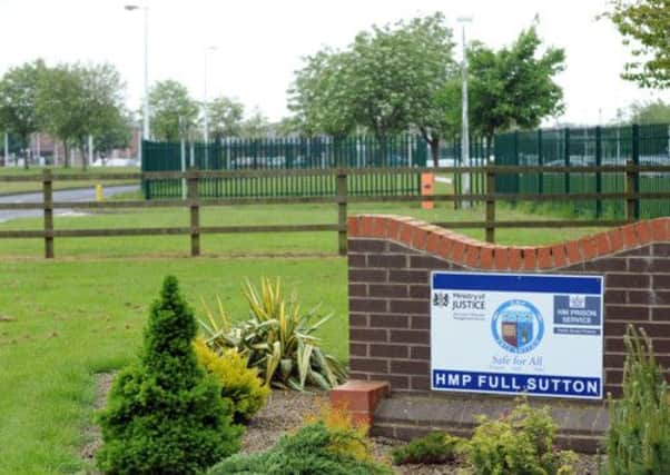 A sign at the entrance to  Full Sutton Prison, proclaiming it "safe for all prisoners, staff and public".