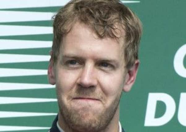 Red Bull driver Sebastian Vettel of Germany celebrates after winning the Canadian Grand Prix