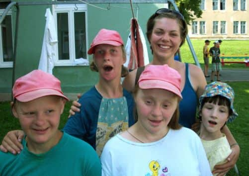 Claire with a group of girls from the orphanage