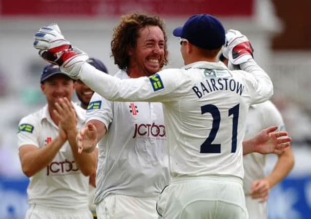 Ryan Sidebottom and Jonny Bairstow celebrate