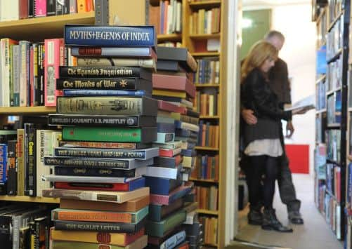 A couple browsing at Fossgate Books, and Tony Fothergill, below.