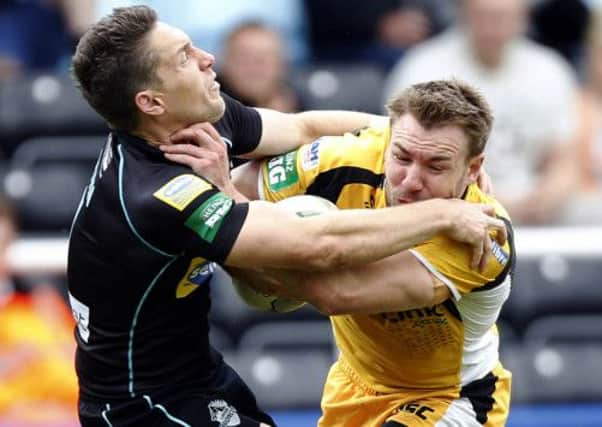 Luke Dorn (left) in match action for London Broncos.