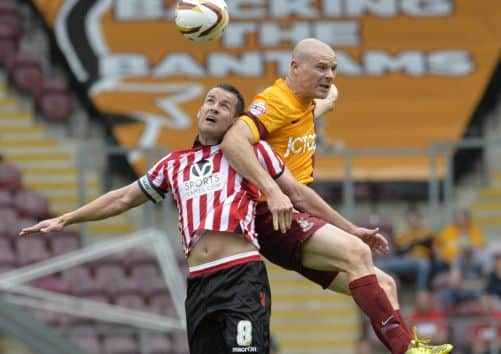 Sheffield United's Michael Doyle, left.