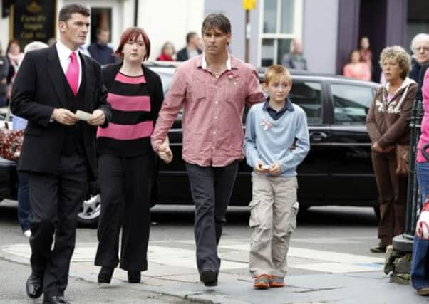 Paul and Coral Jones, parents of April Jones, arrive at St Peter's Church, Machynlleth, ahead of her funeral service.