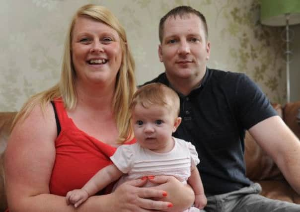 Freya Fenwick with parents Lindsay and James.