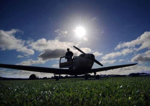 Chris Stringer in the cockpit of the plane, at Sherburn Aero Club.