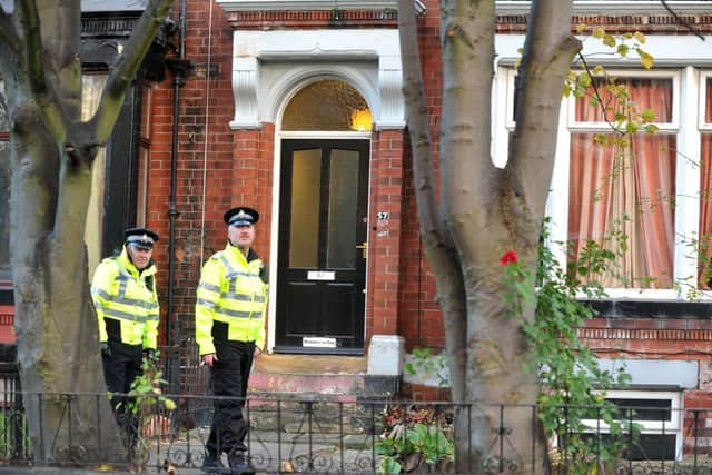 Police officers in Hyde Park, Leeds, where a body was found on Sunday morning.