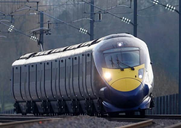 A Hitachi Class 395 Javelin train as it passes through Ashford, Kent, using the HS1 Channel Tunnel Rail Link