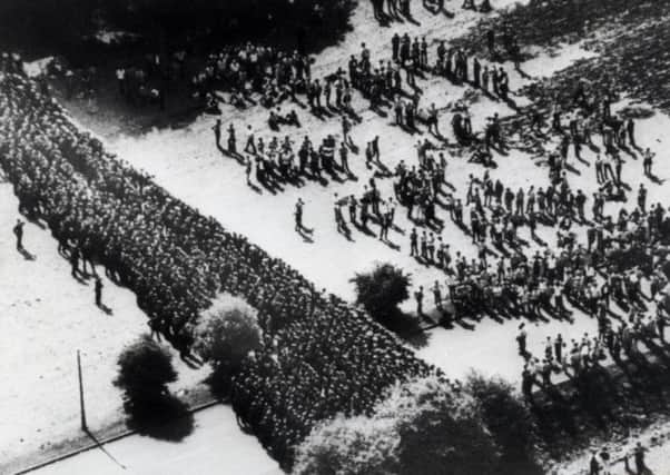 Ranks of police face pickets outside the Orgreave Coking Plant, near Rotherham, in 1984.