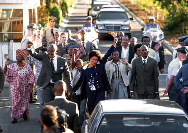 Idris Elba as Nelson Mandela and Naomi Harris and Winnie Mandela