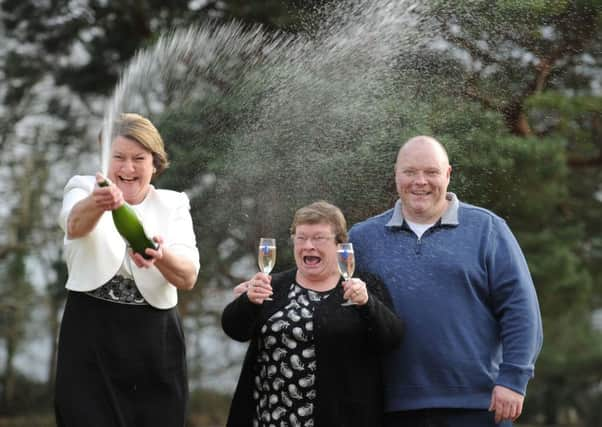 Doreen Hay, 70, with her son John Hay, 38, a cable engineer and his partner Susan Robinson, 39