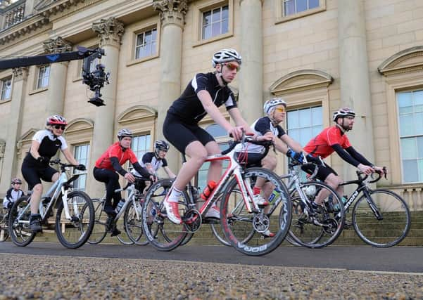 Local cycle enthusists. Below: Tour de France winner Oscar Pereiro, who had flown in from Spain