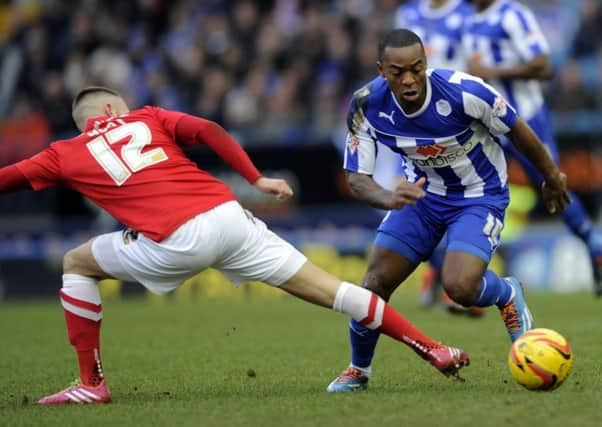 Jacques Maghoma goes past Jack Hunt.