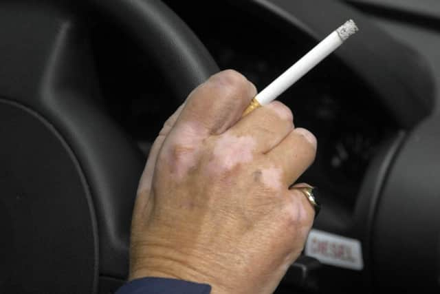 Smoking in cars in the presence of children is to be outlawed in England by the end of the year