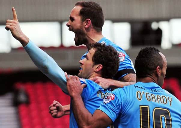 Barnsley's Nick Proschwitz celebrates his first goal