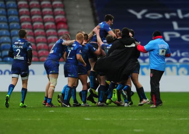 NICE ONE: Hull KR players celebrate Travis Burns  conversion, the last kick of the game to pull out a draw (TJ1002/50o). Picture by Tony Johnson