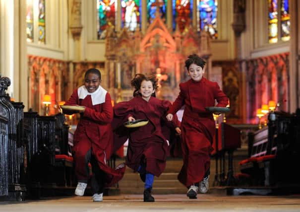 Pancake Races at Leeds Minster. Picture by Simon Hulme