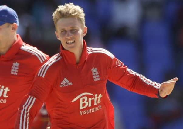 England's Joe Root celebrates a wicket on Wednesday (Picture: Ricardo Mazalan/AP).