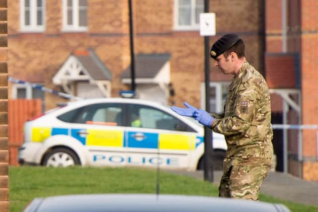 Emergency services at Chestnut Grove, Mexborough, near Doncaster, where a 55-year-old man has been arrested on suspicion of possessing explosives.