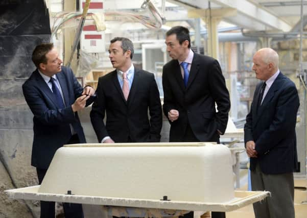 From left, Jason McCartney MP, David Mosley, Adam Mosley and Maurice Mosley at Trojan Plastics