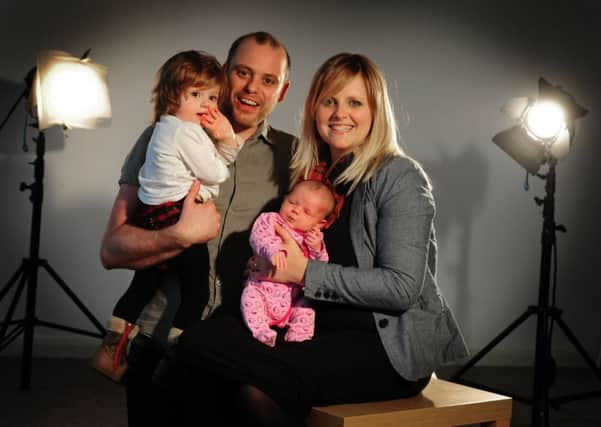 Film-makers Stewart and Katie Ross with their daughters  Molly-Mae and Lola. Picture by Tony Johnson