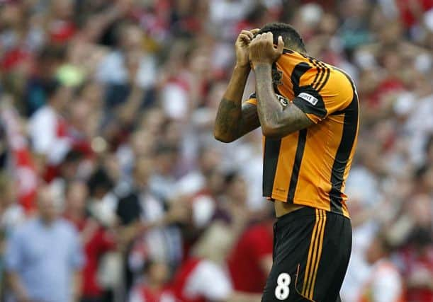 Hull City's Tom Huddlestone reacts at full time.