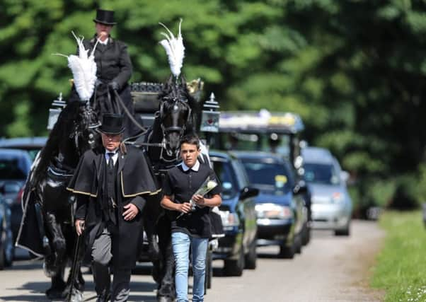 The horse dawn carriage carying Jasmyn Chan towards the chapel at City Road Crematorium, Sheffield.