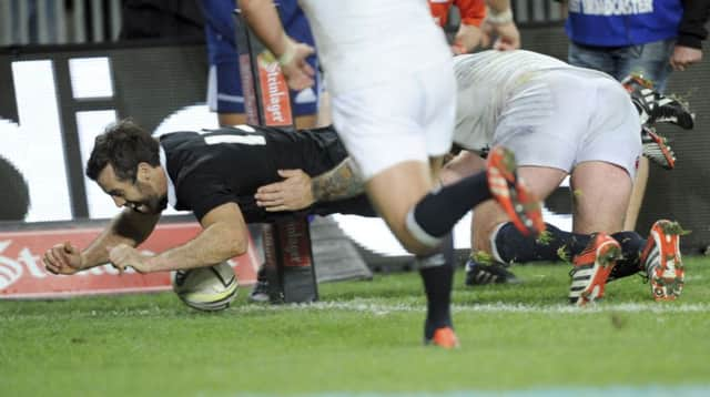 New Zealands Conrad Smith celebrates after scoring the winning try at Eden Park against England.