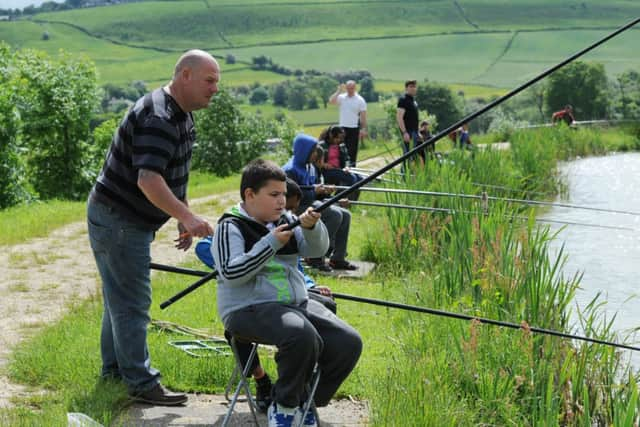 Mick Bradbury at his Fairview Fishing lakes, Cottingley,  Bradford.  Pictures by Bruce Rollinson