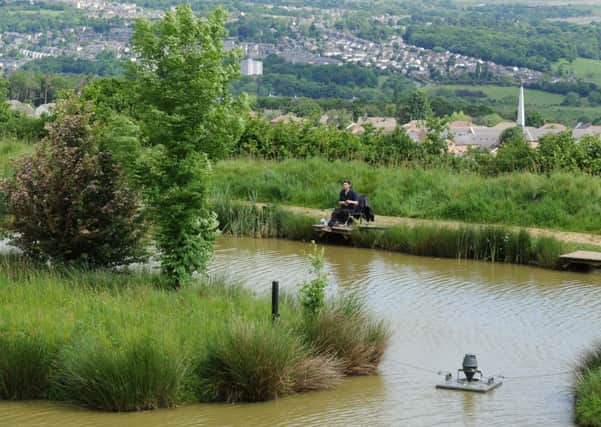 Mick Bradbury at his Fairview Fishing lakes, Cottingley,  Bradford.  Pictures by Bruce Rollinson