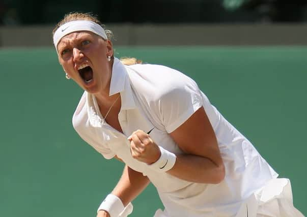 Czech Republics Petra Kvitova celebrates beating compatriot Lucie Safarova to reach the final of the womens singles (Picture: John Walton/PA).