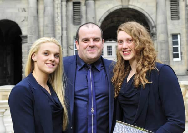 Sheffield swim coach Russ Barber with Eleanor Faulkner, left, and Rebecca Turner.