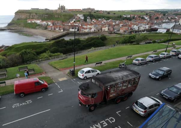 Elizabeth makes her way through the streets of Whitby. Picture by Gerard Binks.