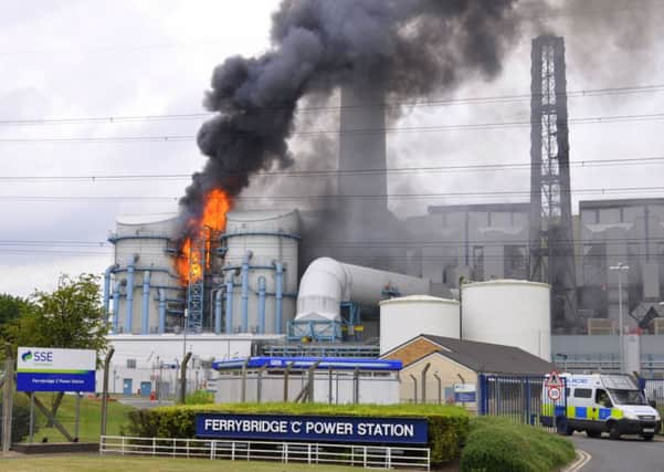 The blaze at Ferrybridge C Power Station.  Picture: Matthew Merrick Photography. Below: Twitter pictures from Sammy Holmes and Suzanne Palmer