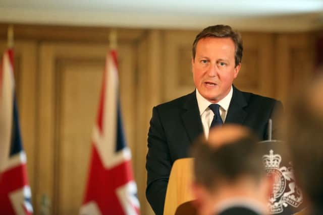 Prime Minister David Cameron speaks at a news conference in Downing Street