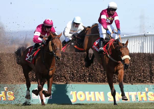 wetherby-bound: First Lieutenant, seen winning the 2013 Betfred Bowl at Aintree with jockey Bryan Hughes, is expected to take part in the Charlie Hall Chase at Wetherby on Saturday, November 1.